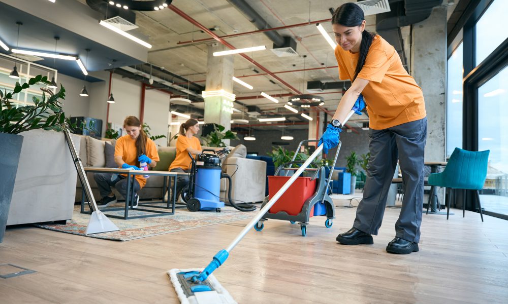 Cleaning company employees are dressed in work clothes