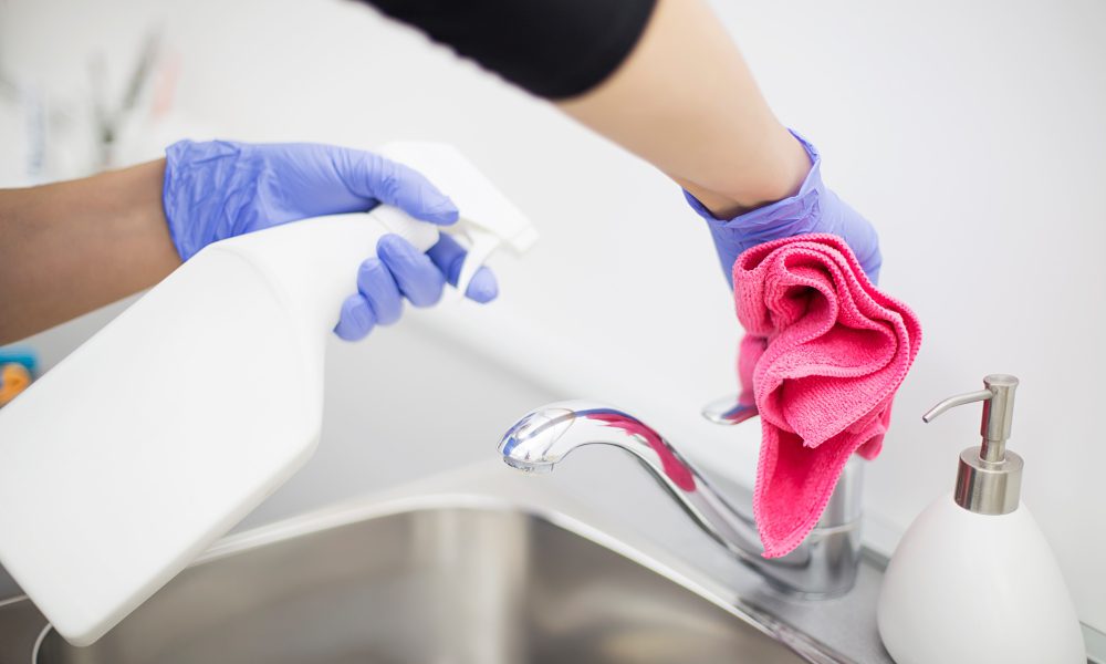 Cleaning lady cleans cleaning tap