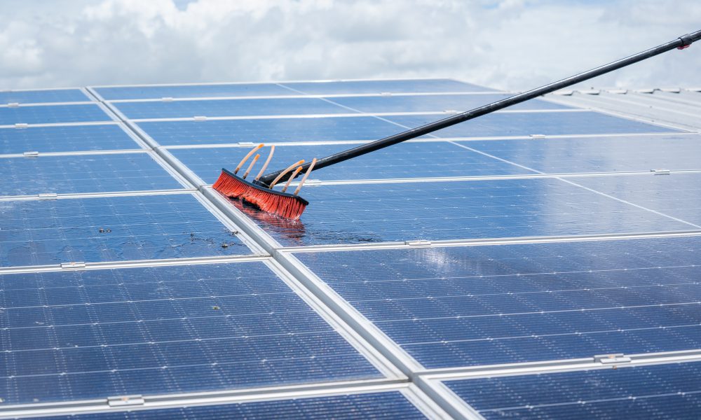 labor working on cleaning solar panel at solar power plant,Professional cleaning,Solar panels.