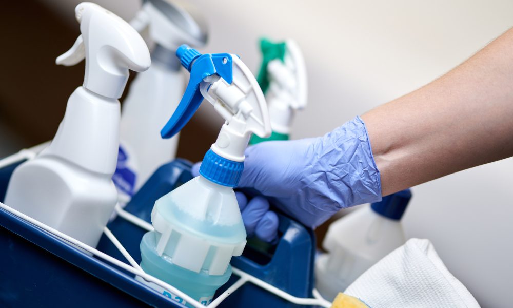 Set of cleaning supplies for hotel room cleaning