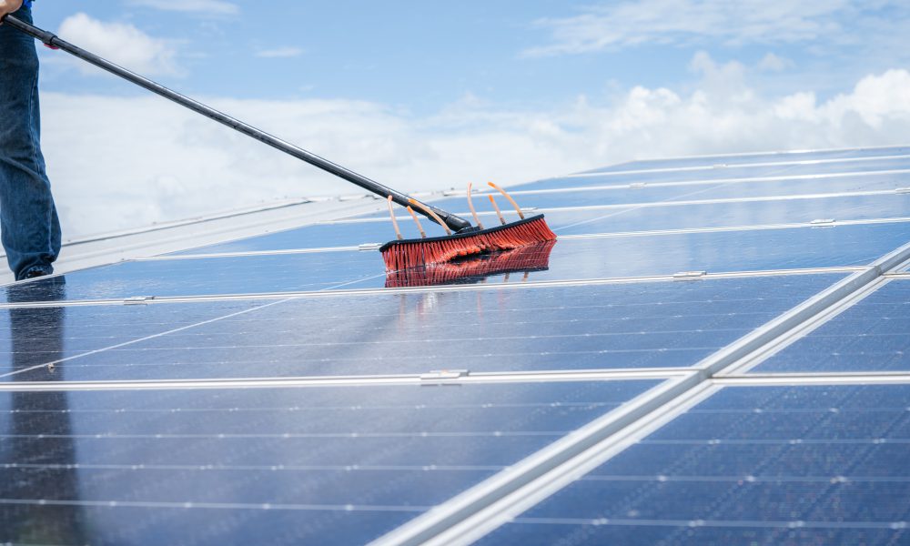 Technicians are cleaning solar panel,Clean solar panel in solar power plant.